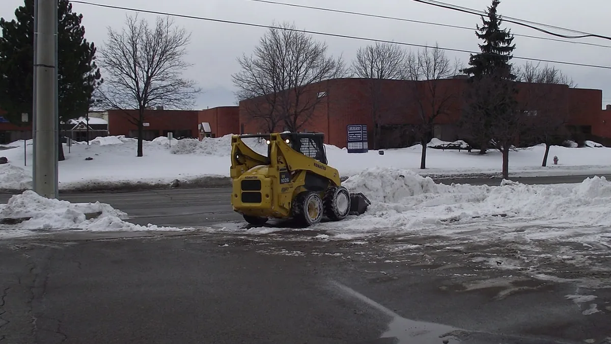 Ambient snow plowing scene in Guelph